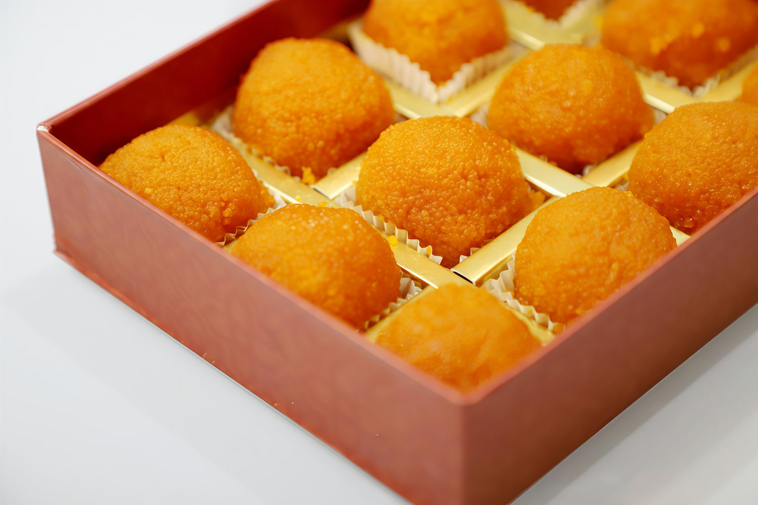 Karvi Mithaas Logo – Homemade Laddoos & Indian Sweets Brand